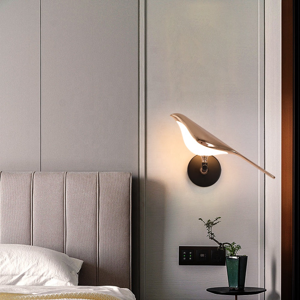 Bird wall lamp gold and black finish, close-up