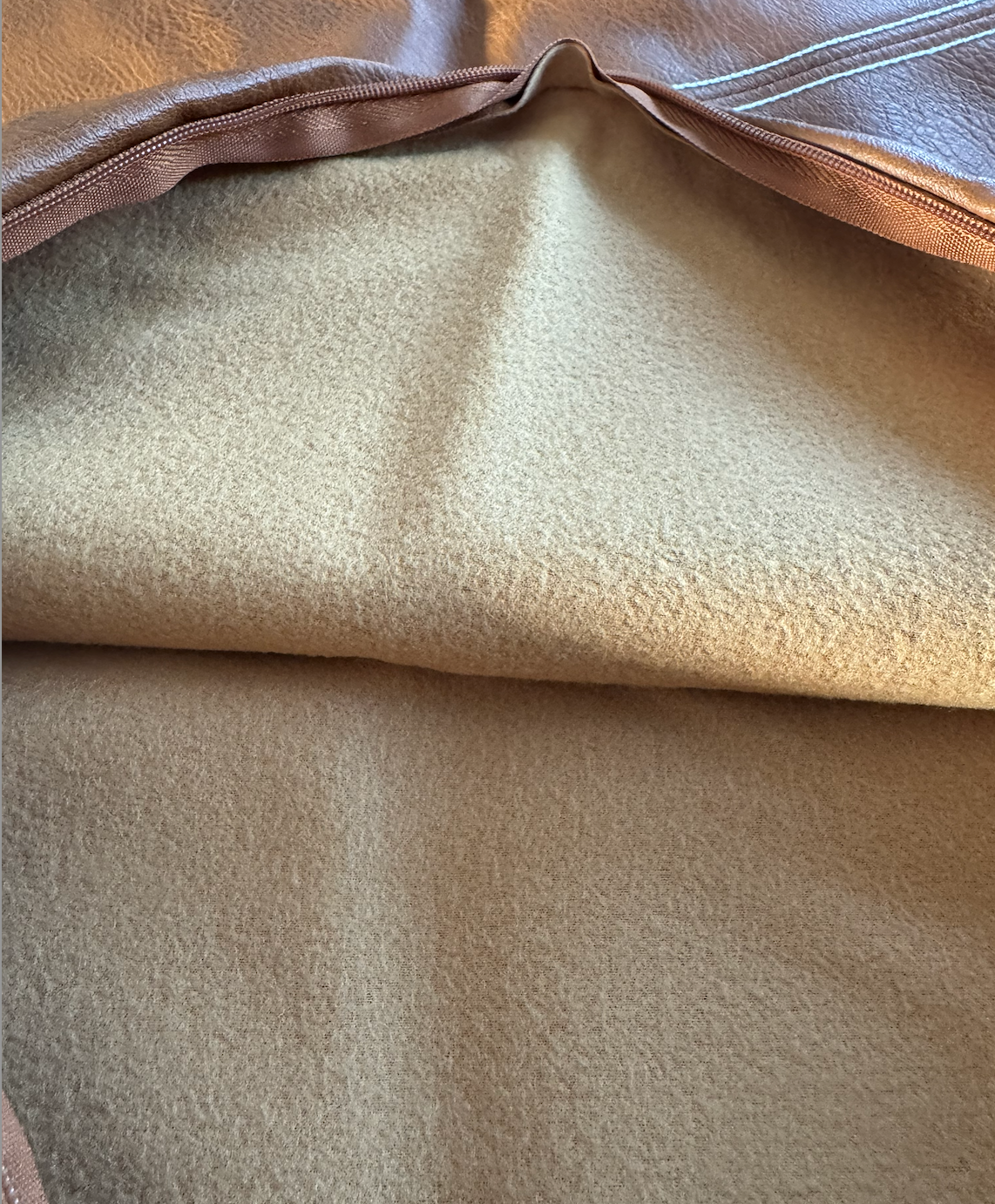Hidden zipper detail on Milan diagonal faux leather cushion cover