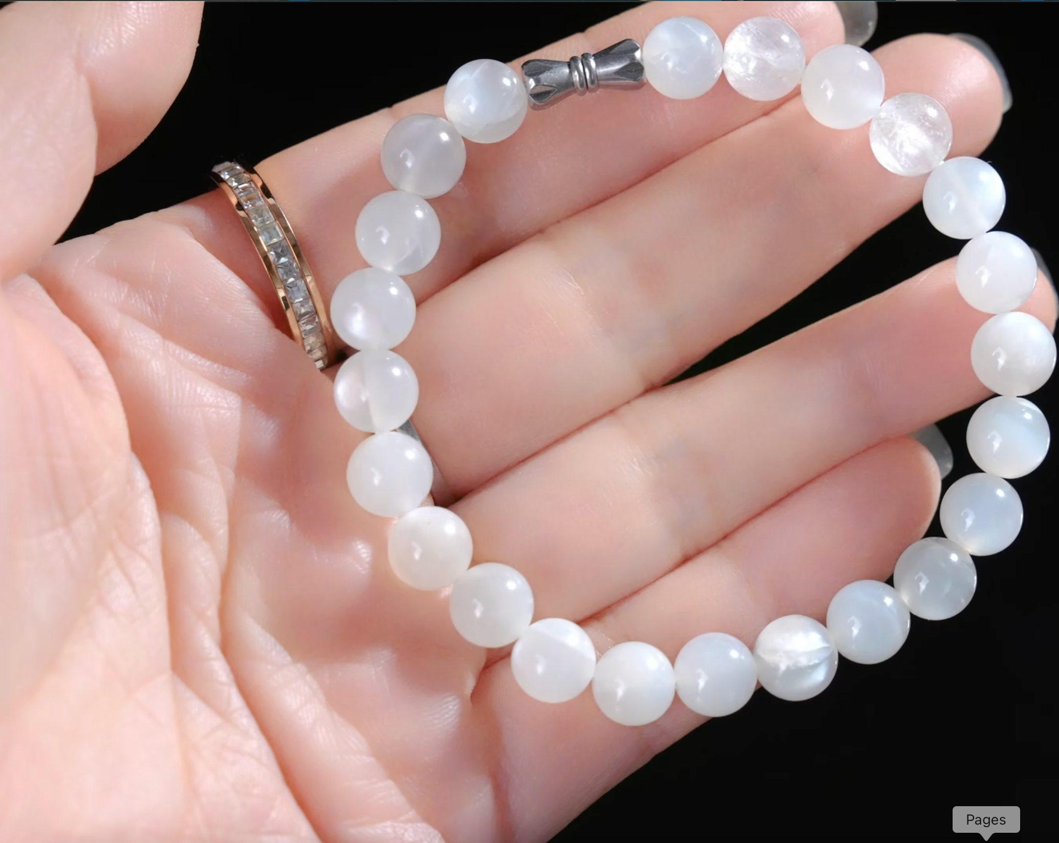 Close-up of natural white moonstone beads and pendant
